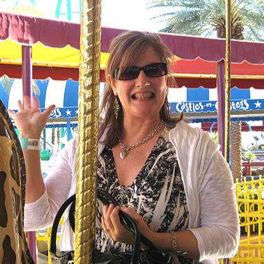 woman on a merry-go-ground